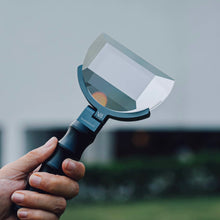 Load image into Gallery viewer, A close-up, in-situ shot of the LLP V6 Quadrilateral D filter being held in a photographer’s hand. The image showcases the filter’s professional build quality, precise scale, and ergonomic design, giving potential users a clear sense of its look and feel in a real-world shooting scenario.