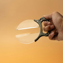 Load image into Gallery viewer, LLPLAB V8 centerfield split diopter in handheld mode, showcasing its ergonomic grip designed for quick, on-the-go cinematic adjustments.
