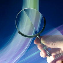Load image into Gallery viewer, A close-up, in-hand photograph showcasing the LLPLAB V4 Linear Prism Handheld Filter. The image highlights its compact design for mobile use and the precise optical glass that creates clean light streaks, perfect for adding dynamic effects to both smartphone and SLR photography.
